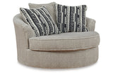 Calnita Sisal Oversized Swivel Chair and Ottoman from Ashley - Luna Furniture