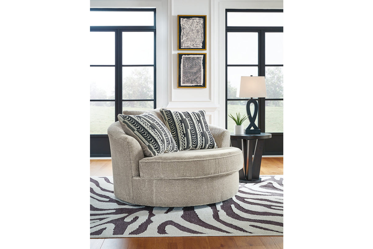 Calnita Sisal Oversized Swivel Chair and Ottoman from Ashley - Luna Furniture