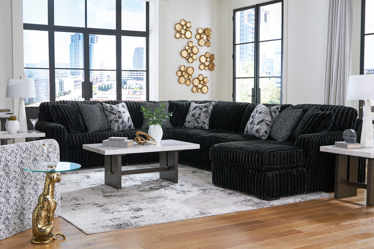 Midnight-Madness 4-Piece Sectional with Ottoman in Onyx