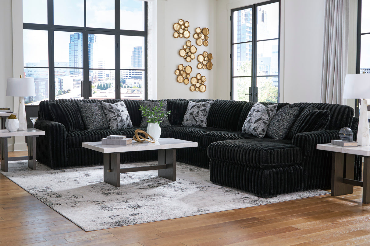 Midnight-Madness 4-Piece Sectional with Ottoman in Onyx