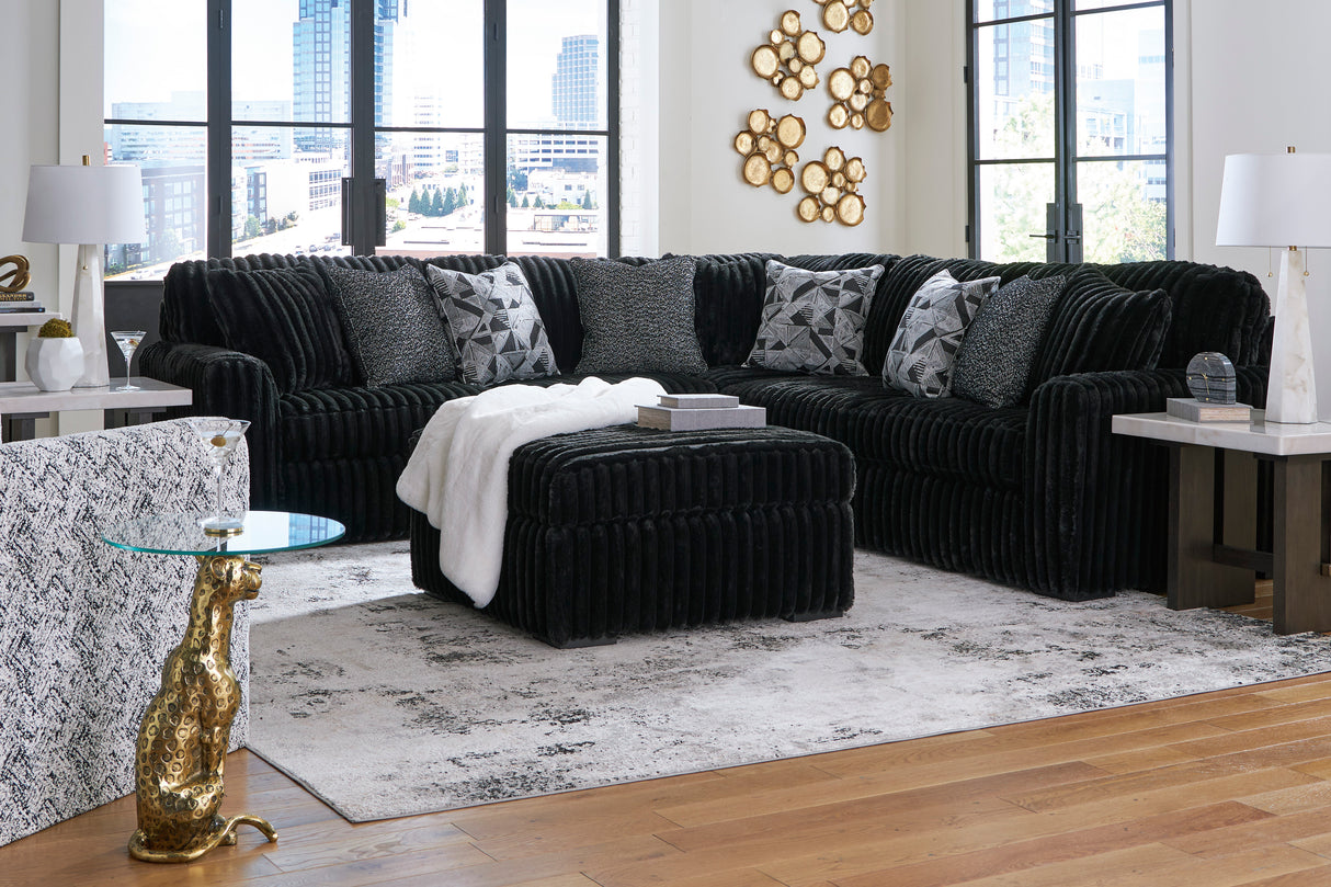 Midnight-Madness 3-Piece Sectional with Ottoman in Onyx