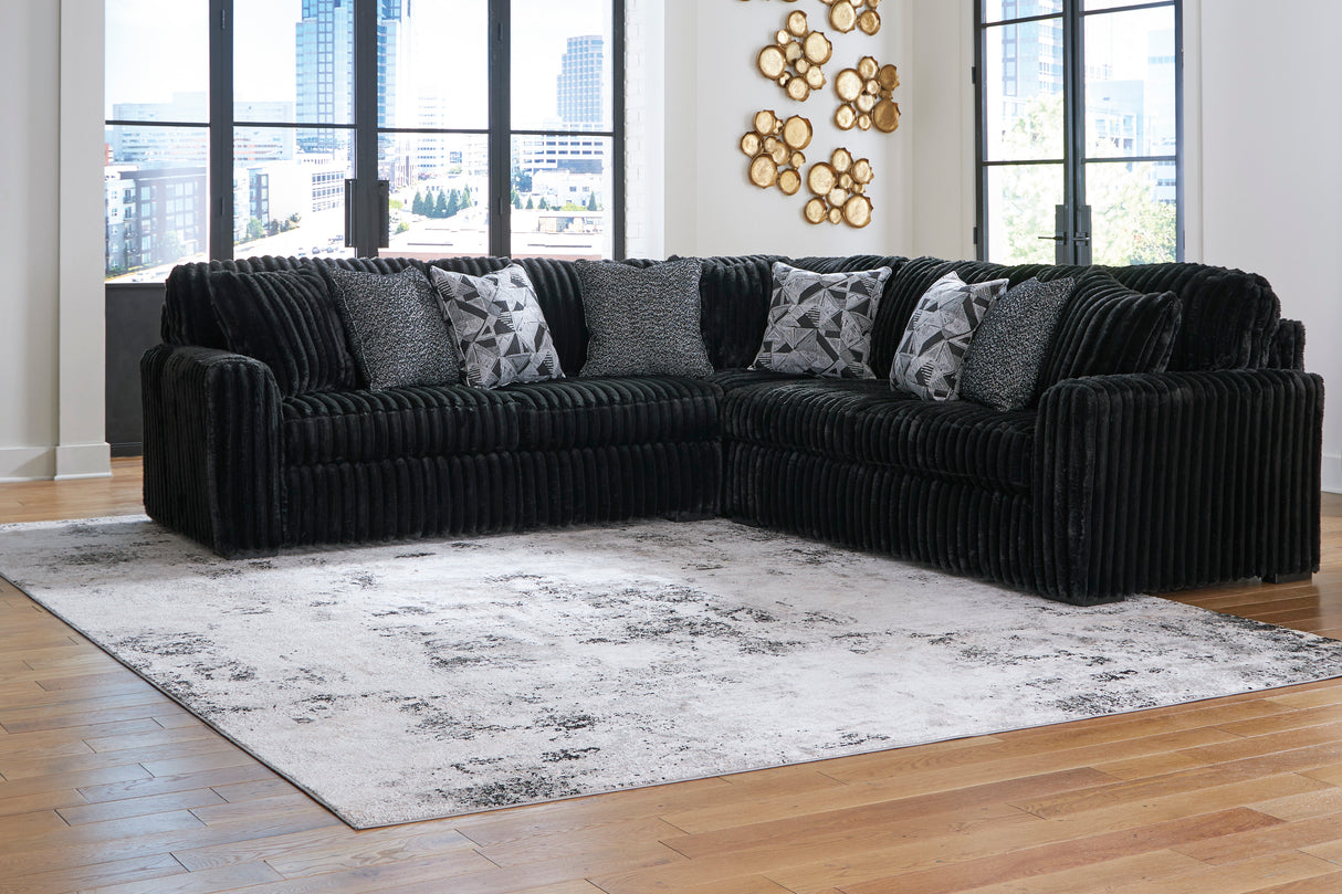 Midnight-Madness 3-Piece Sectional with Ottoman in Onyx