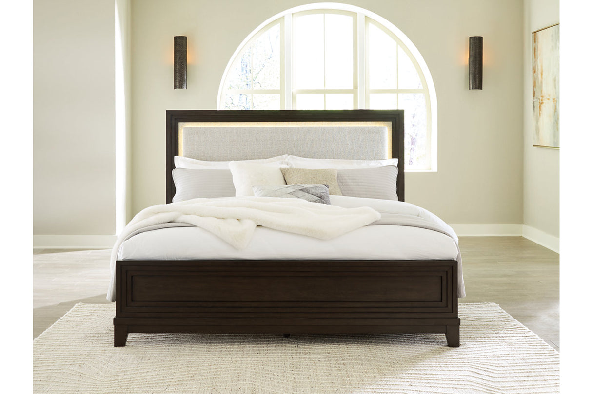 Neymorton Dark Grayish Brown Queen Upholstered Panel Bed from Ashley - Luna Furniture