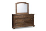 Flynnter Medium Brown Dresser and Mirror from Ashley - Luna Furniture