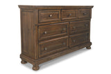 Flynnter Medium Brown Dresser and Mirror from Ashley - Luna Furniture