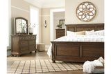 Flynnter Medium Brown Dresser and Mirror from Ashley - Luna Furniture