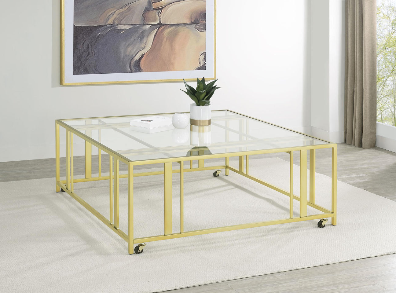 Adri Square Glass Top Coffee Table with Casters Matte Brass from Coaster - Luna Furniture