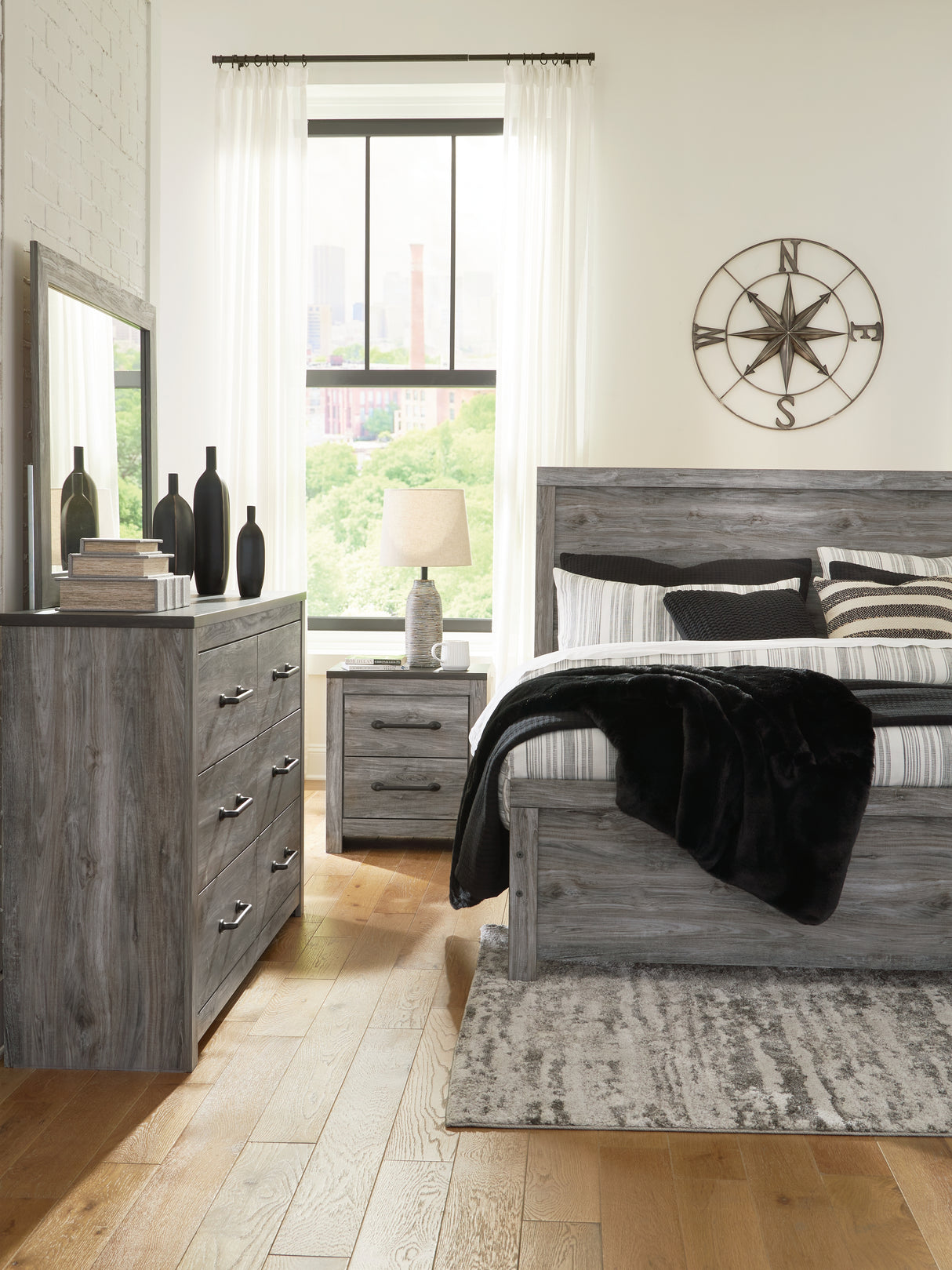 Bronyan King Panel Bed with Mirrored Dresser and 2 Nightstands in Dark Gray - PKG014948