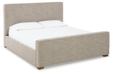 Brown Dakmore California King Upholstered Bed with Mirrored Dresser and 2 Nightstands - PKG014663