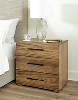 Brown Dakmore California King Upholstered Bed with Mirrored Dresser, Chest and Nightstand - PKG014665