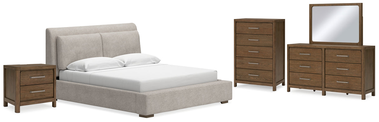 Cabalynn California King Upholstered Bed with Mirrored Dresser, Chest and Nightstand in Light Brown - PKG015739