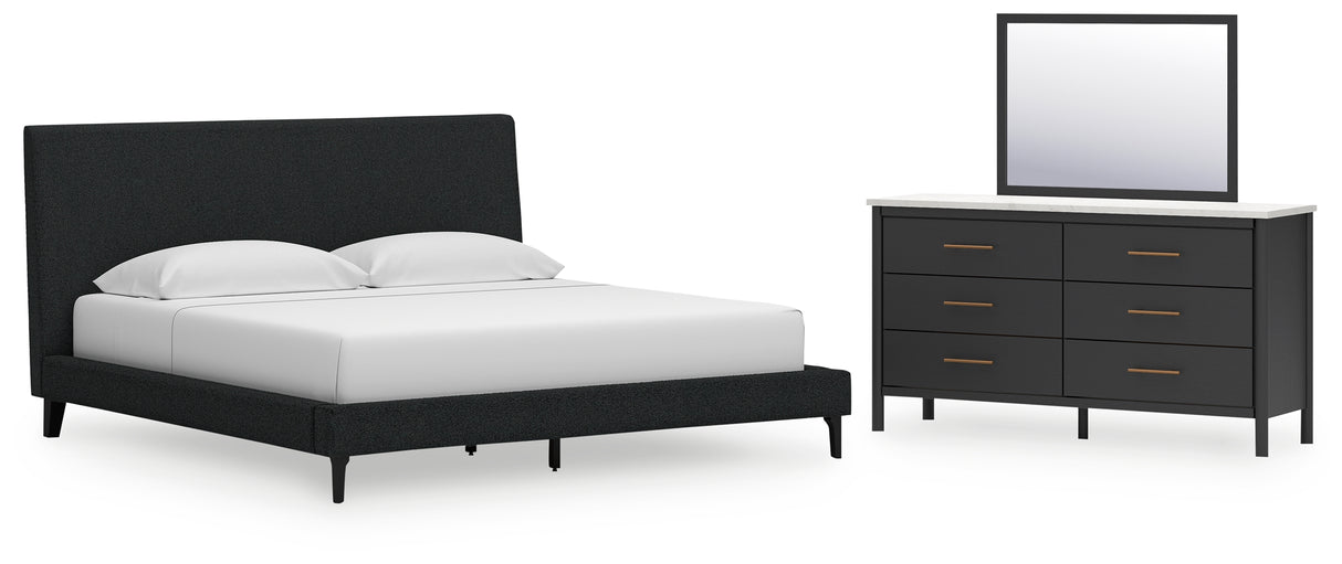 Cadmori King Upholstered Bed with Mirrored Dresser in Black - PKG020695