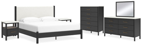 Cadmori King Upholstered Panel Bed with Mirrored Dresser, Chest and 2 Nightstands in Black/White - PKG020277