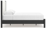 Cadmori Queen Upholstered Panel Bed with 2 Nightstands in Black/White from Ashley - Luna Furniture