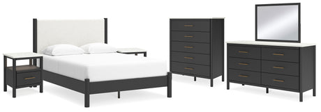 Cadmori Queen Upholstered Panel Bed with Mirrored Dresser, Chest and 2 Nightstands in Black/White - PKG020259