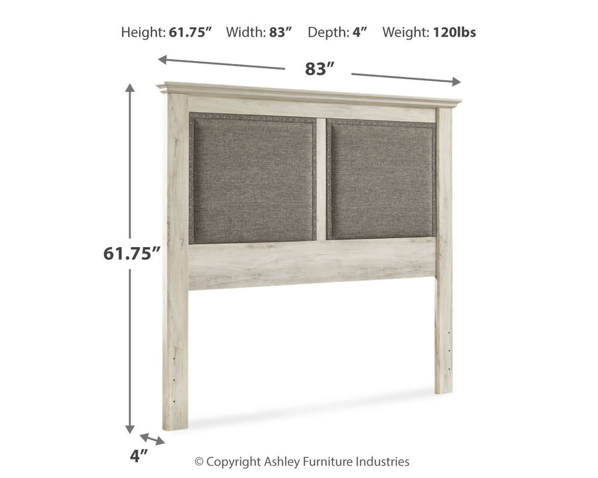 Cambeck King/California King Upholstered Panel Headboard with Mirrored Dresser and Chest in Whitewash - PKG010590