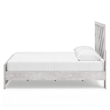 Cayboni King Panel Bed with Dresser and Nightstand in Whitewash from Ashley - Luna Furniture