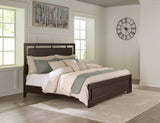 Covetown California King Panel Bed with Dresser and Nightstand in Dark Brown - PKG019184