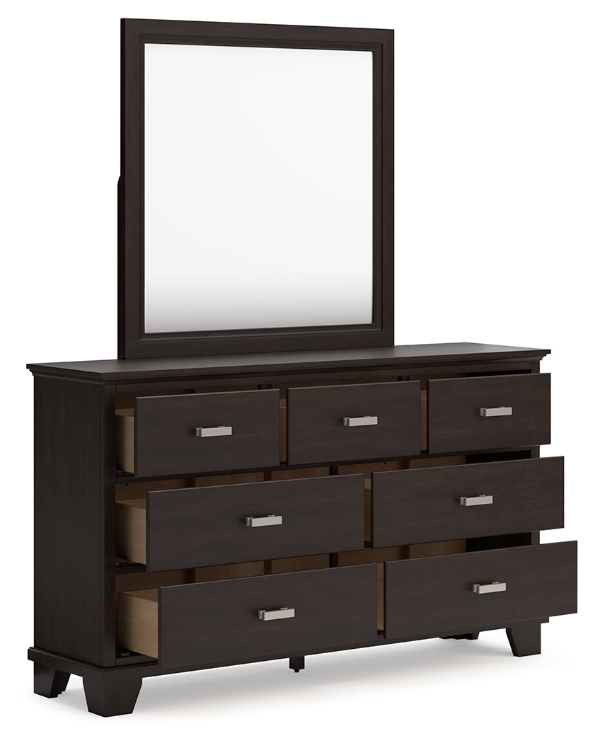 Covetown California King Panel Bed with Mirrored Dresser and Nightstand in Dark Brown - PKG016823