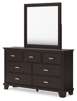 Covetown California King Panel Bed with Mirrored Dresser, Chest and 2 Nightstands in Dark Brown - PKG016822