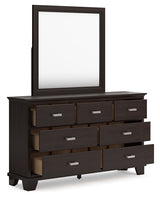 Covetown California King Panel Bed with Mirrored Dresser in Dark Brown - PKG016820