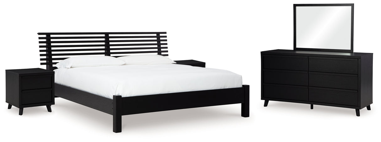 Danziar King Panel Bed with Mirrored Dresser and 2 Nightstands in Black from Ashley - Luna Furniture