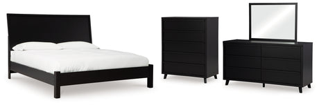 Danziar King Panel Bed with Mirrored Dresser and Chest in Black from Ashley - Luna Furniture