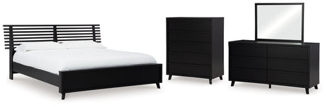 Danziar King Panel Bed with Mirrored Dresser and Chest in Black from Ashley - Luna Furniture