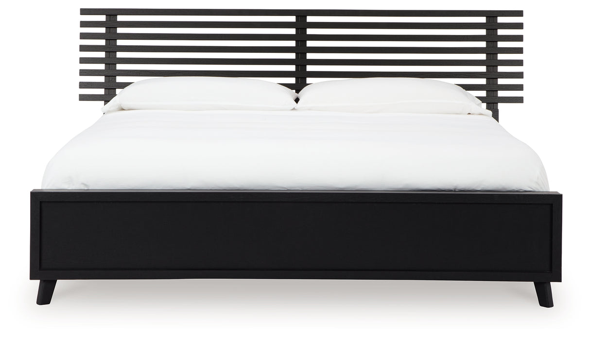 Danziar King Panel Bed with Mirrored Dresser and Chest in Black from Ashley - Luna Furniture