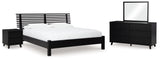 Danziar King Panel Bed with Mirrored Dresser and Nightstand in Black from Ashley - Luna Furniture