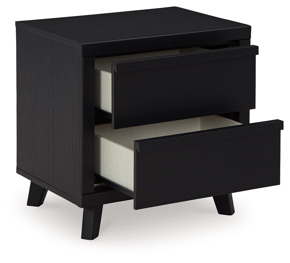 Danziar King Panel Bed with Mirrored Dresser and Nightstand in Black - PKG015916