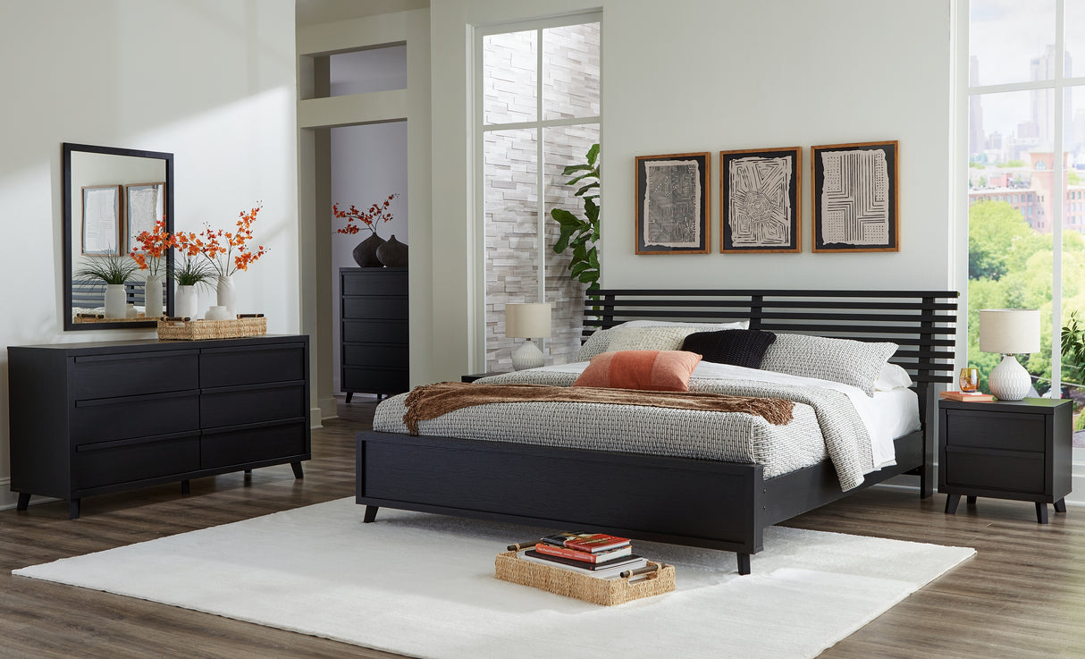 Danziar King Panel Bed with Mirrored Dresser and Nightstand in Black from Ashley - Luna Furniture