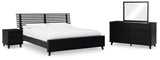 Danziar King Panel Bed with Mirrored Dresser and Nightstand in Black from Ashley - Luna Furniture