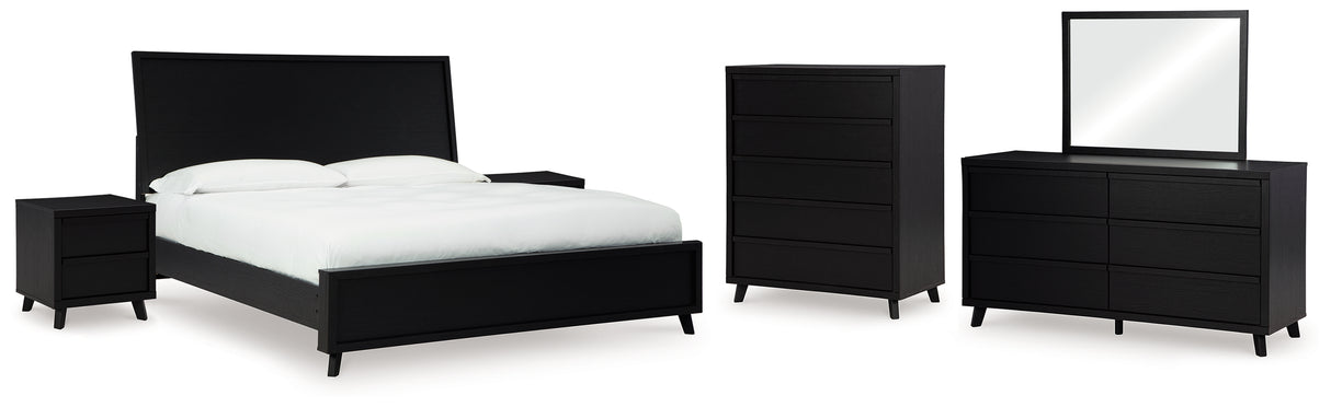 Danziar King Panel Bed with Mirrored Dresser, Chest and 2 Nightstands in Black from Ashley - Luna Furniture