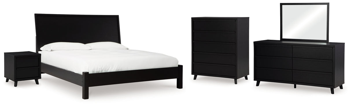 Danziar King Panel Bed with Mirrored Dresser, Chest and Nightstand in Black from Ashley - Luna Furniture