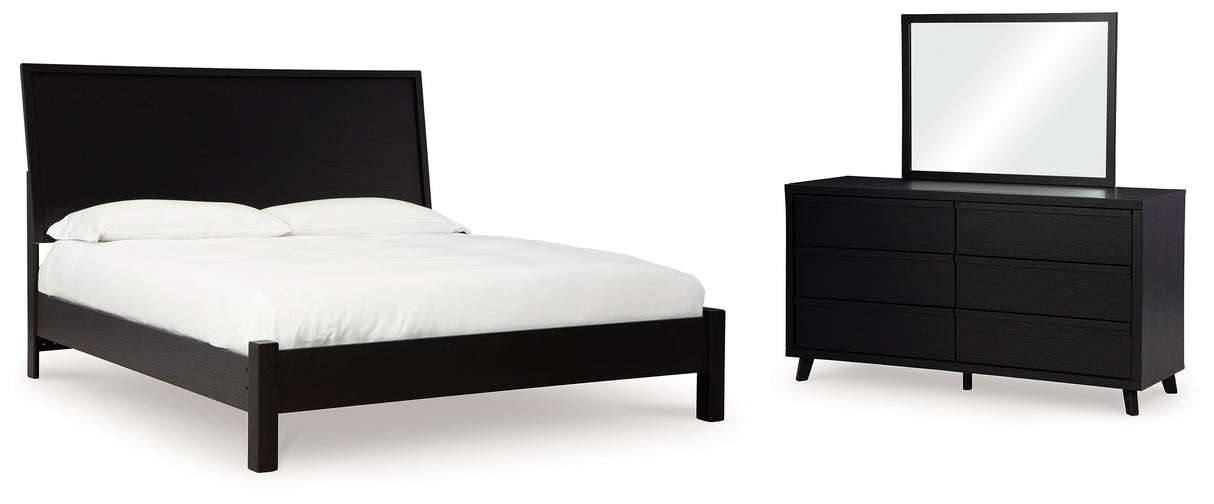 Danziar King Panel Bed with Mirrored Dresser in Black - PKG015883