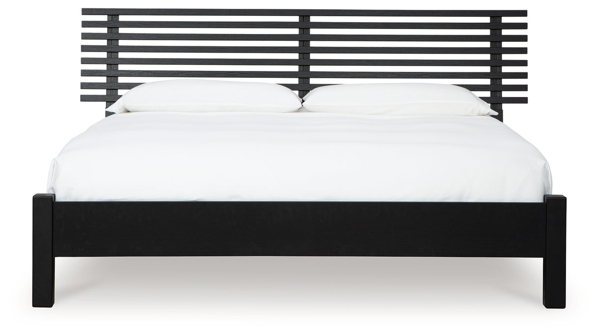 Danziar King Panel Bed with Mirrored Dresser in Black from Ashley - Luna Furniture