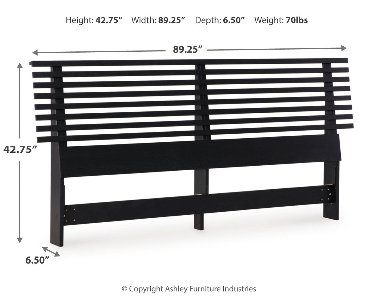 Danziar King Panel Headboard with Mirrored Dresser and Nightstand in Black from Ashley - Luna Furniture