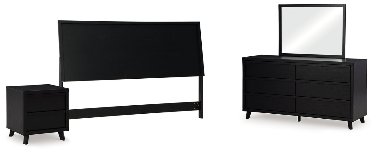 Danziar King Panel Headboard with Mirrored Dresser and Nightstand in Black - PKG016024