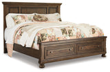 Flynnter California King Panel Bed with 2 Storage Drawers with Mirrored Dresser and Chest in Medium Brown from Ashley - Luna Furniture