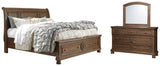 Flynnter King Sleigh Bed with 2 Storage Drawers with Mirrored Dresser in Medium Brown from Ashley - Luna Furniture