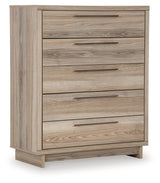 Hasbrick King Panel Headboard with Mirrored Dresser and Chest in Tan from Ashley - Luna Furniture