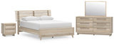 Hasbrick Queen Panel Bed with Mirrored Dresser and Nightstand in Tan from Ashley - Luna Furniture