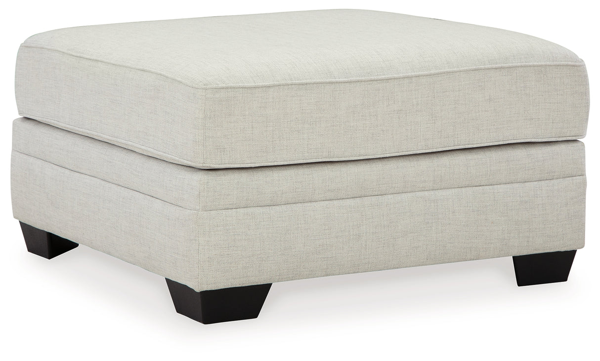 Huntsworth 2-Piece Sectional with Ottoman in Dove Gray - PKG015091