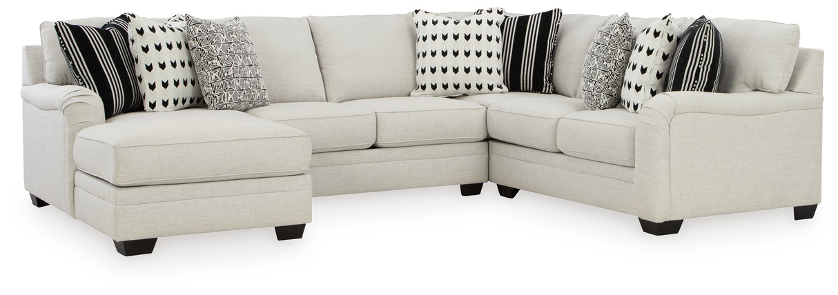 Huntsworth 4-Piece Sectional with Ottoman in Dove Gray - PKG015093