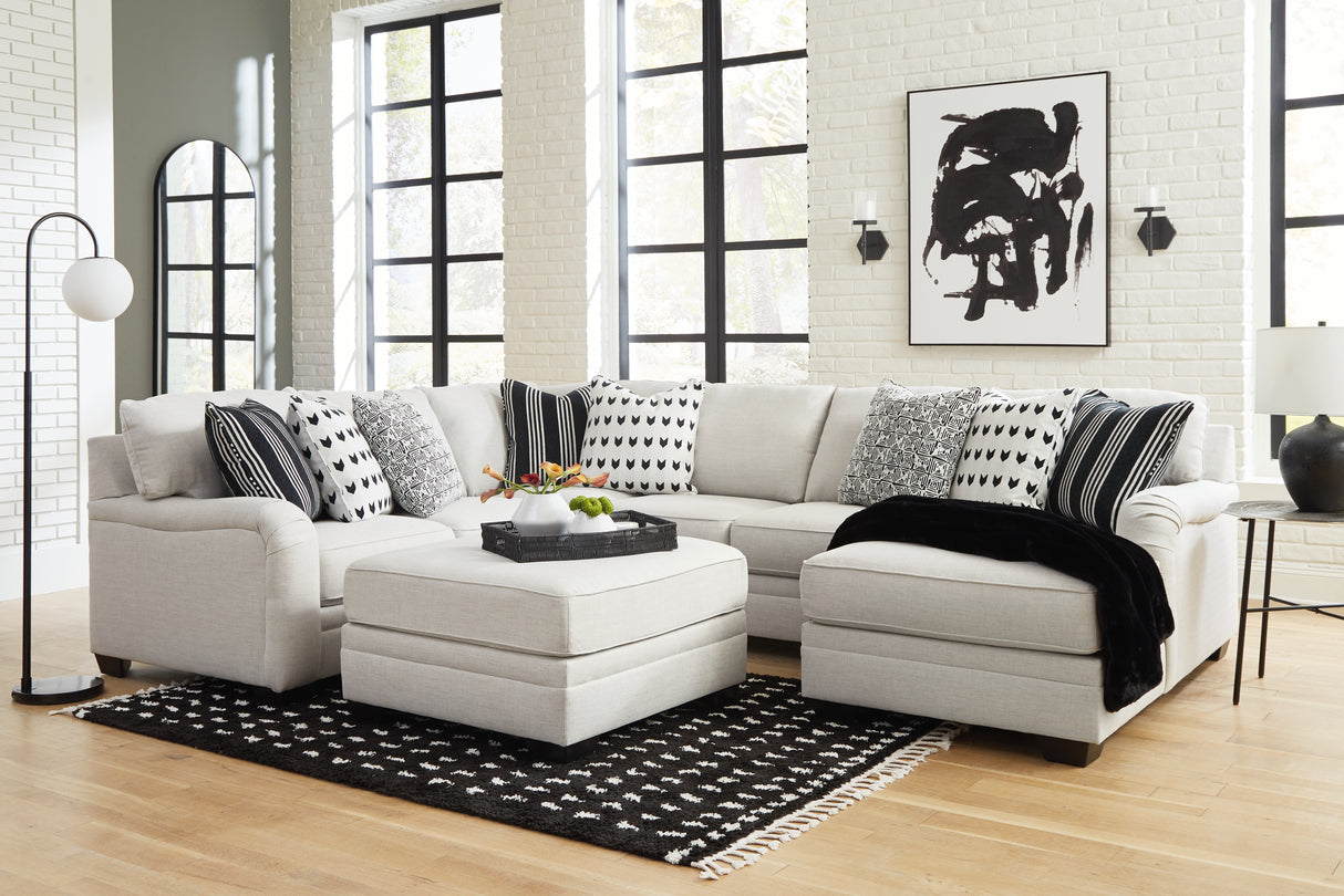 Huntsworth 4-Piece Sectional with Ottoman in Dove Gray - PKG015094