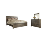 Juararo California King Panel Bed with Mirrored Dresser in Dark Brown - PKG004054