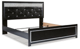 Kaydell King Upholstered Panel Bed with Mirrored Dresser and Chest in Black - PKG014230