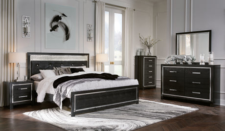 Kaydell King Upholstered Panel Bed with Mirrored Dresser, Chest and 2 Nightstands in Black - PKG014232