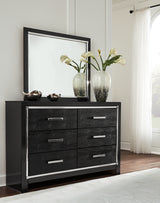 Kaydell King Upholstered Panel Bed with Mirrored Dresser in Black - PKG014228